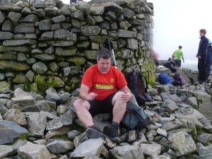 Neil's decided that fresh socks are needed for the descent. It also helped clear the summit for a while!!!