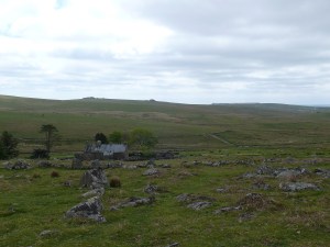 Looking down from Eastern Tor to Ditsworthy Warren House with the Trowlesworthy Tors beyond