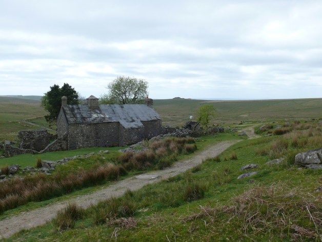 The back of Ditsworthy Warren House with Legis Tor in the distance