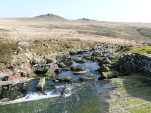 West Dart Weir looking down the West Dart and up to Longaford Tor