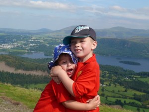 The boys hug it out on the summit!