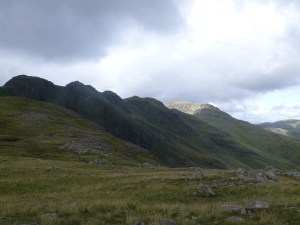 The aptly named Crinkle Crags, Bowfell in the sun at the far end