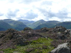 The lumpy summit of Grange Fell, Great Gable the high point right with the Scafells in shadow at the back