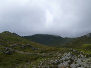 Helvellyn summit withthe low cloud clearing for a minute