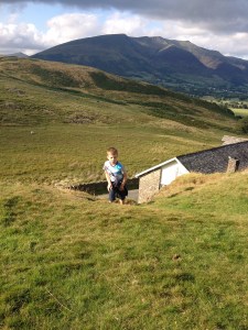 Climbing away from the church with Blencathra behind
