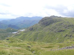 On the path to Sergeant Man, Pavey Ark on the right and a small part of Stickle Tarn