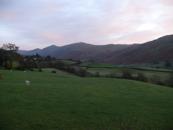 As the sun lights the Ill Bell ridge opposite