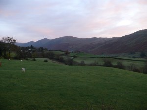 As the sun lights the Ill Bell ridge opposite