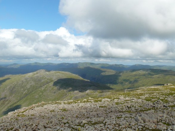 Over Allen Crags to the distant Helvellyn range.