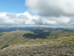 Over Allen Crags to the distant Helvellyn range.