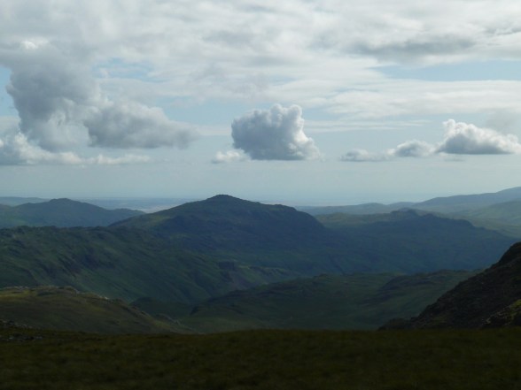 Moody looking Harter Fell with the Duddon estuary just visible beyond.