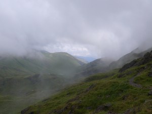Cloud lifts to reveal Styhead Tarn behind us.