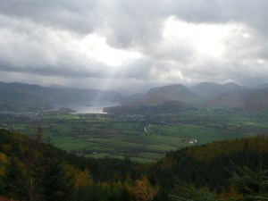 That doesn't look good, as sunlight pierces the clouds on Derwent Water