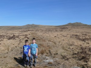 The boys with Sharp Tor left and Hare Tor right