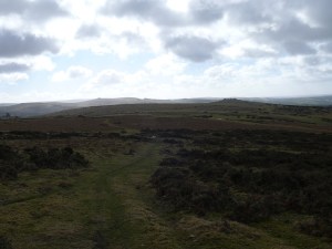 Hazy view with Pew Tor middle right and Plymouth Sound beyond