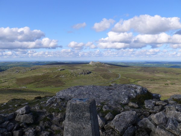 Trig point of Rippon Tor with Haytor behind