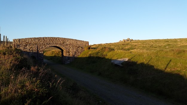 Princetown railway and a bridge with East Tor behind