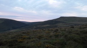 Steep sided Sharp Tor with the River Erme at the bottom