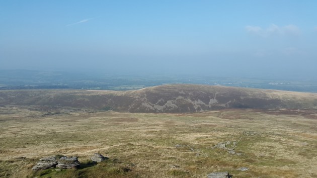 Hazy view to Cornwall with Great Nodden in the foreground